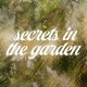 secrets in the garden anthology text overlaid on grass and white flowers painted collage image